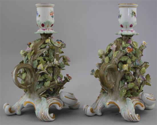 A pair of Meissen arbour chambersticks, early 20th century, 13.5cm, both with losses